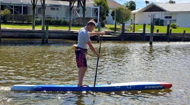 Larry Cain stand up paddleboarding