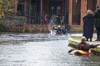 A two  person kayak in motion - Kat Wilson and her partner are finishing a race on the Kennet & Avon canal